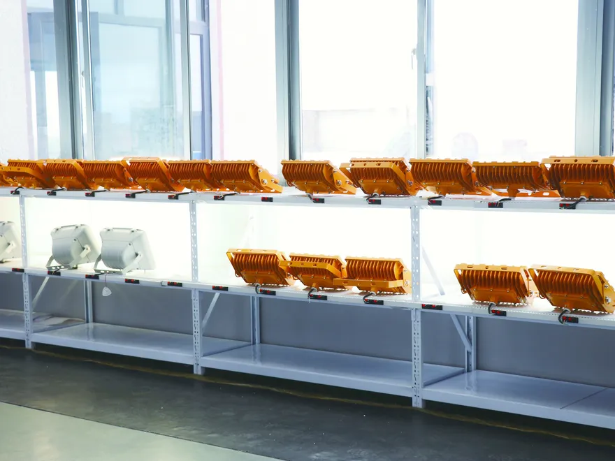 LED burn-in aging racks running assembled industrial luminaires at full power to catch early-life failures before shipment