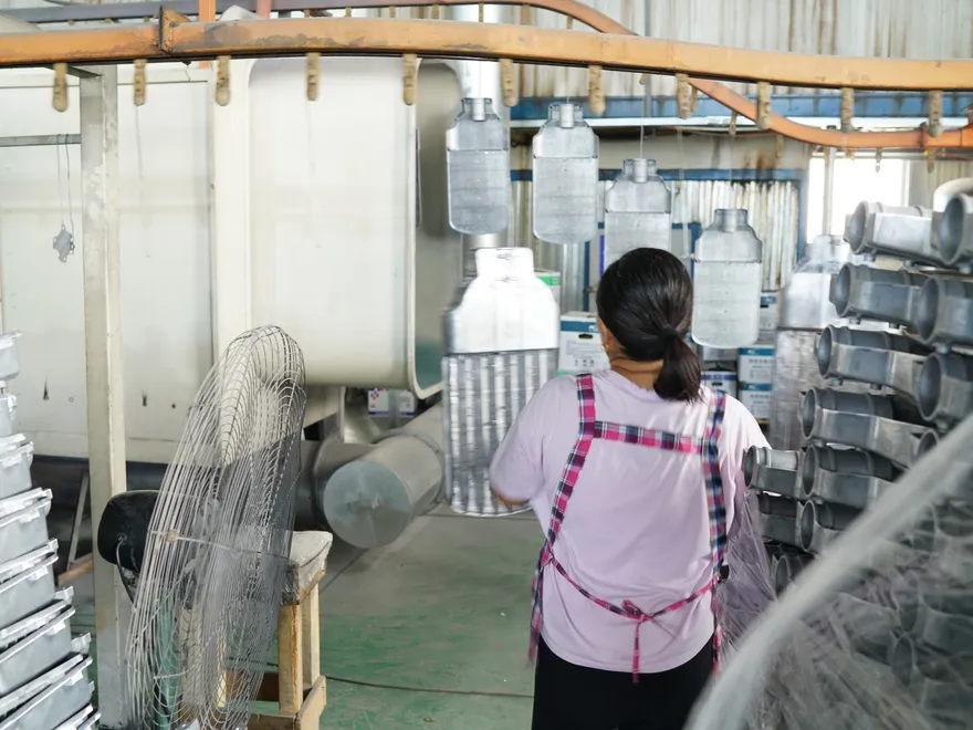 Electrostatic powder coating line applying corrosion-resistant finish to die-cast aluminum LED housings