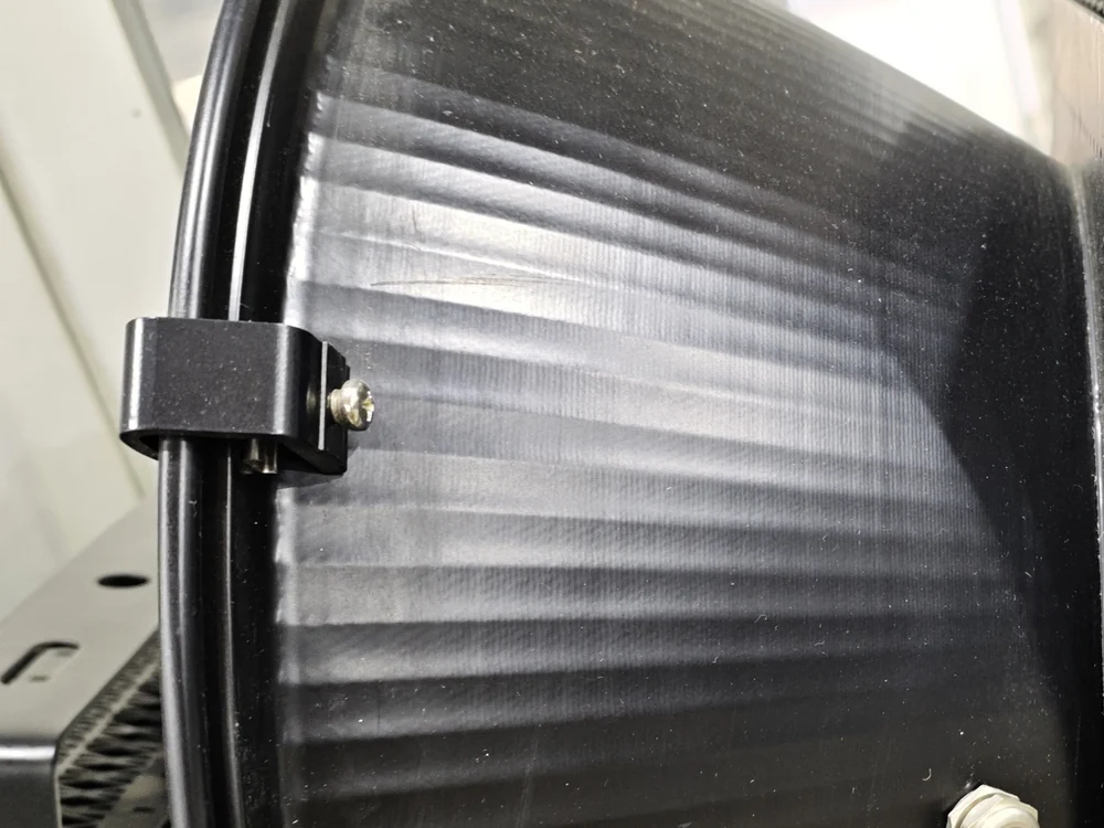 Die-cast aluminum LED high bay body with a ribbed reflector dome and cooling fins, shown close up before final assembly